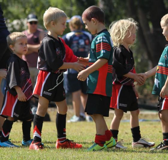 Kids shaking hands after sport